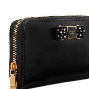 Kate Spade New York

Morgan Bow Bedazzled Bow Patent Leather Zip Around Wallet